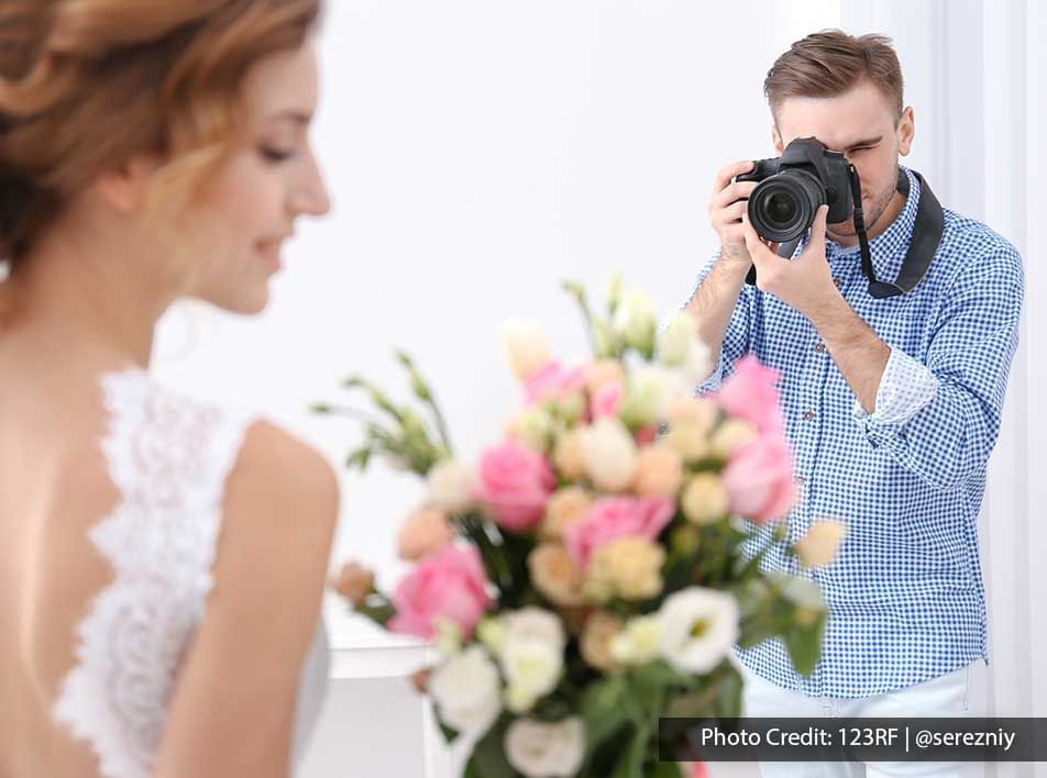 A man was photographing a woman in a wedding dress - Lexis Suites Penang