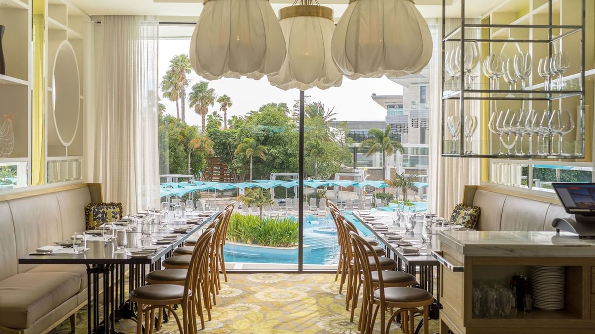 Dining room with tables set for meals in Bistro Guillaume at Crown Metropol Perth