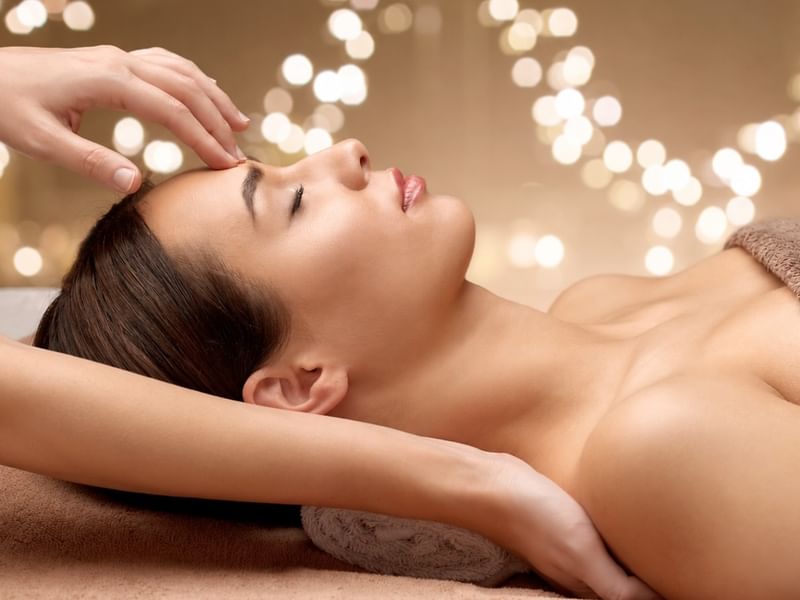 Woman relaxing during festive treatment at Malaysia's Best Spa The Banjaran Hotsprings Retreat