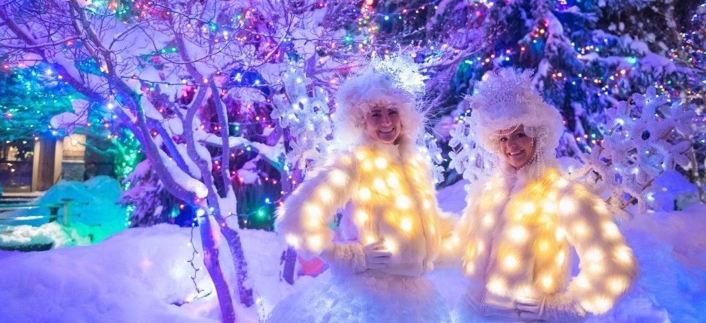 January in Whistler winter performers surrounded by snow and festive lights