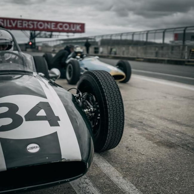History of Silverstone featuring an old Formula 1 Car on the racetrack