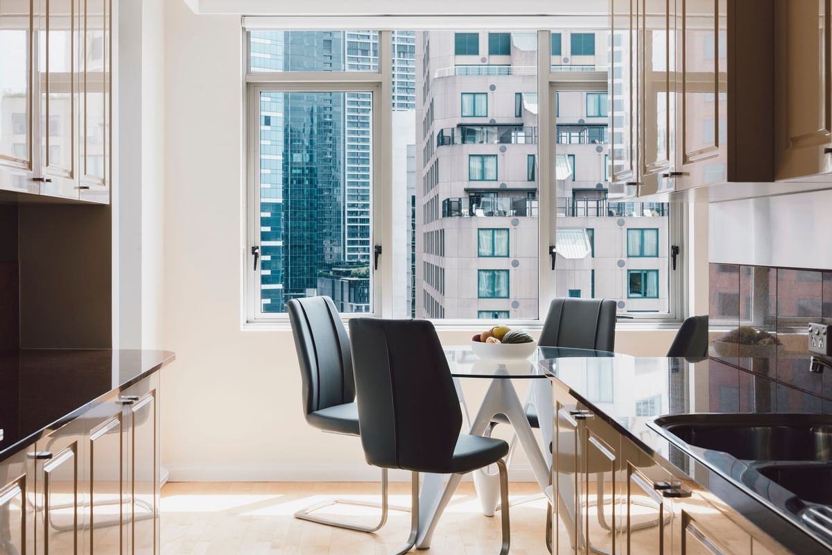 Dining area with a city view in 2 Bedroom 2 Bathroom Premium Apartment at Quay West Suites Melbourne