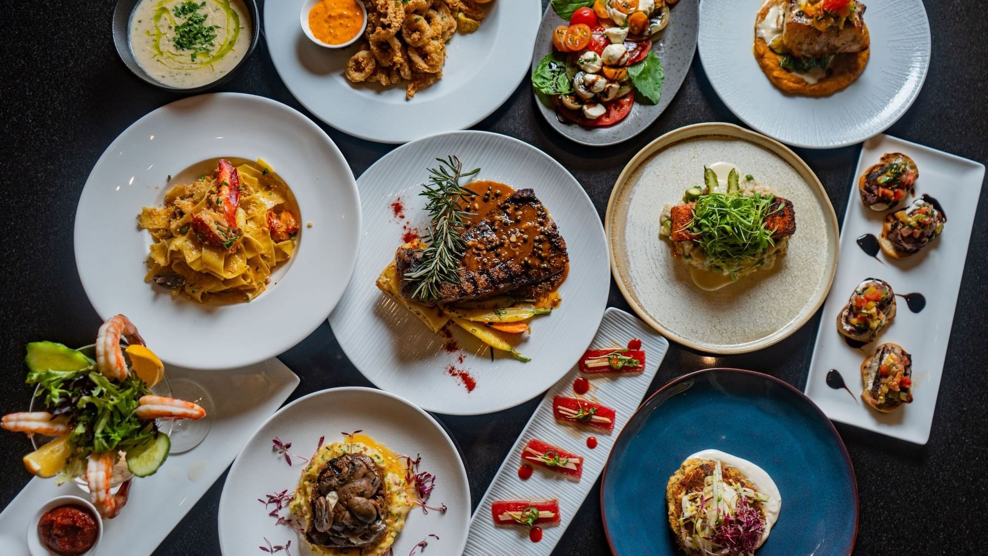 Variety of authentic dishes served in The Landmark Prime Rib at Warwick Melrose Dallas