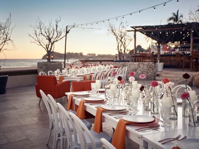 Cortez Grill and Restaurant during the evening function at Hacienda del Mar Los Cabos, with long tables and ocean views