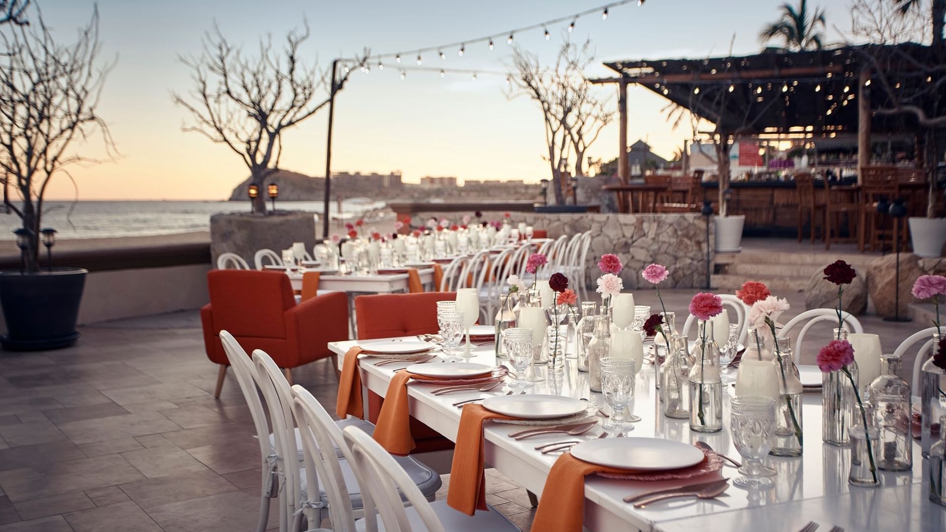 Cortez Grill and Restaurant during the evening function at Hacienda del Mar Los Cabos, with long tables and ocean views