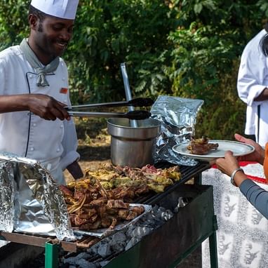 Serving meals in The Crater Lunch at Ngorongoro Serena
