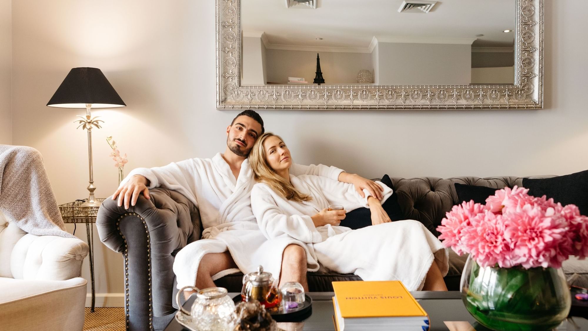 Couple relaxing on a sofa at Stephanies Luxury Spa near Sofitel Brisbane Central