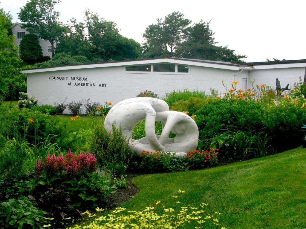 Green garden with white statue in front of the Ogunquit Museum Of Art near Ogunquit Collection