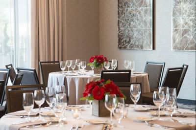 red flowers on event table