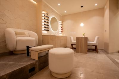 Lounge and nail polish rack on the wall in Serena spa at Villa Premiere Boutique Hotel & Romantic Getaway