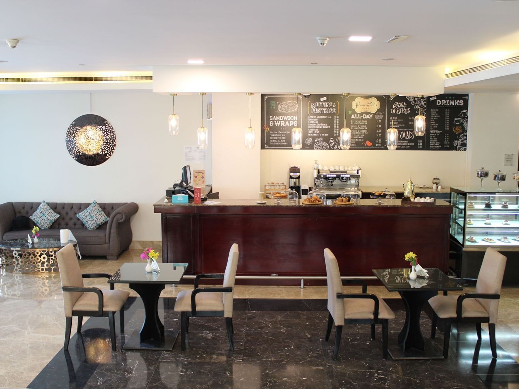 Interior view of Primo Dolci Café at Millennium Central Mafraq