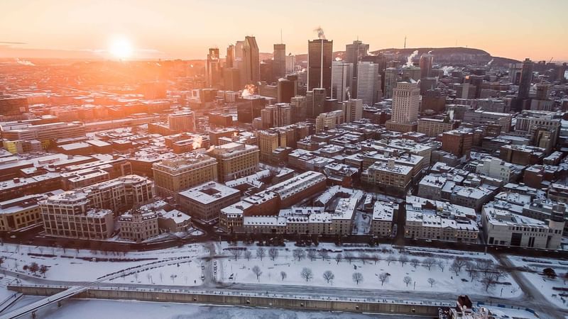 Aerial view of illuminated Montreal in Winter near Warwick Le Crystal