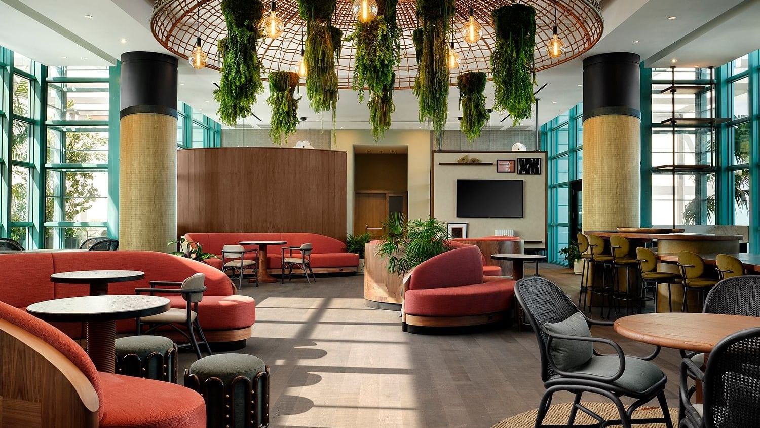 Contemporary executive lounge with comfortable seating and panoramic views of the intracoastal and Atlantic Ocean.