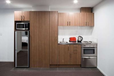 Kitchen area in a Bedroom Apartment at Nesuto St Martins