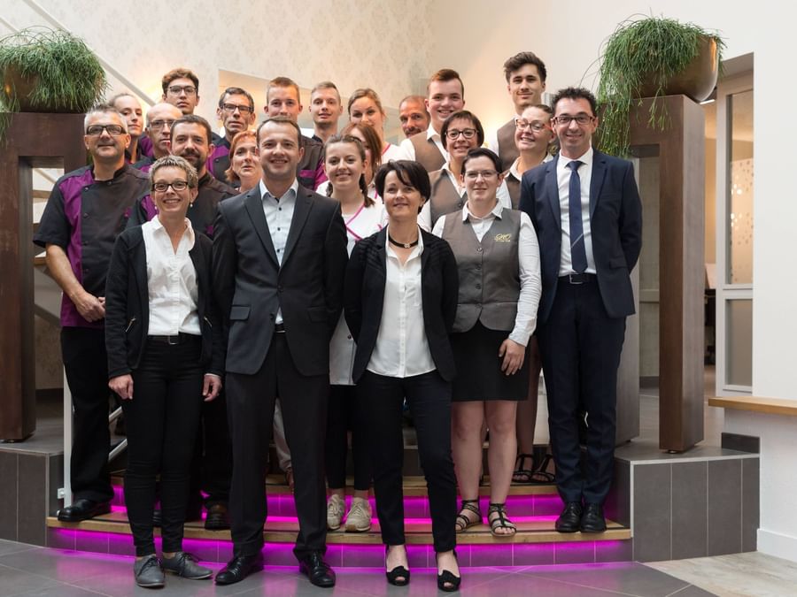 An image of team members at Hotel Le Lion d'Or