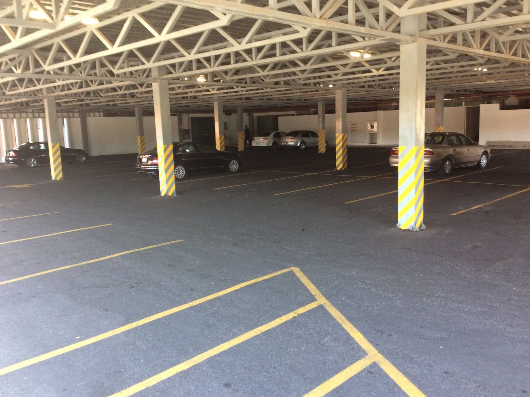 Indoor spacious parking area at Gamma Hotels