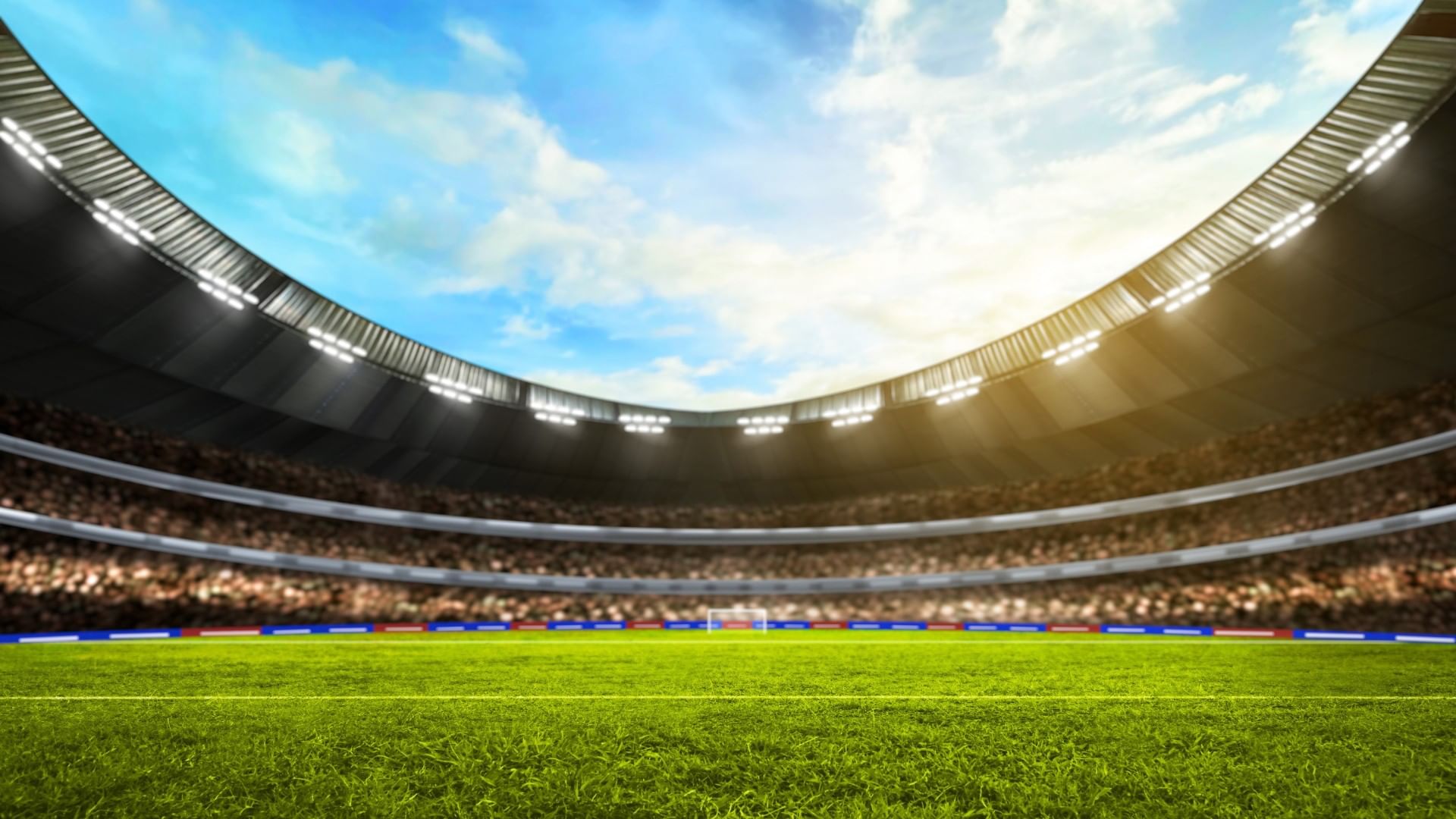 Interior view of a professional Estadio Akron with a bright blue sky above near Quinta Real Guadalajara