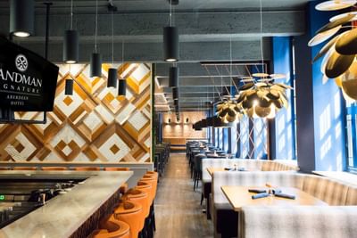The Dining Area at at the Sandman Signature Aberdeen Hotel with 