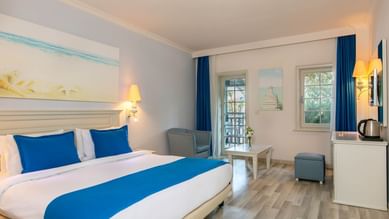 Bedroom with a king-size bed at Kairaba Bodrum Imperial