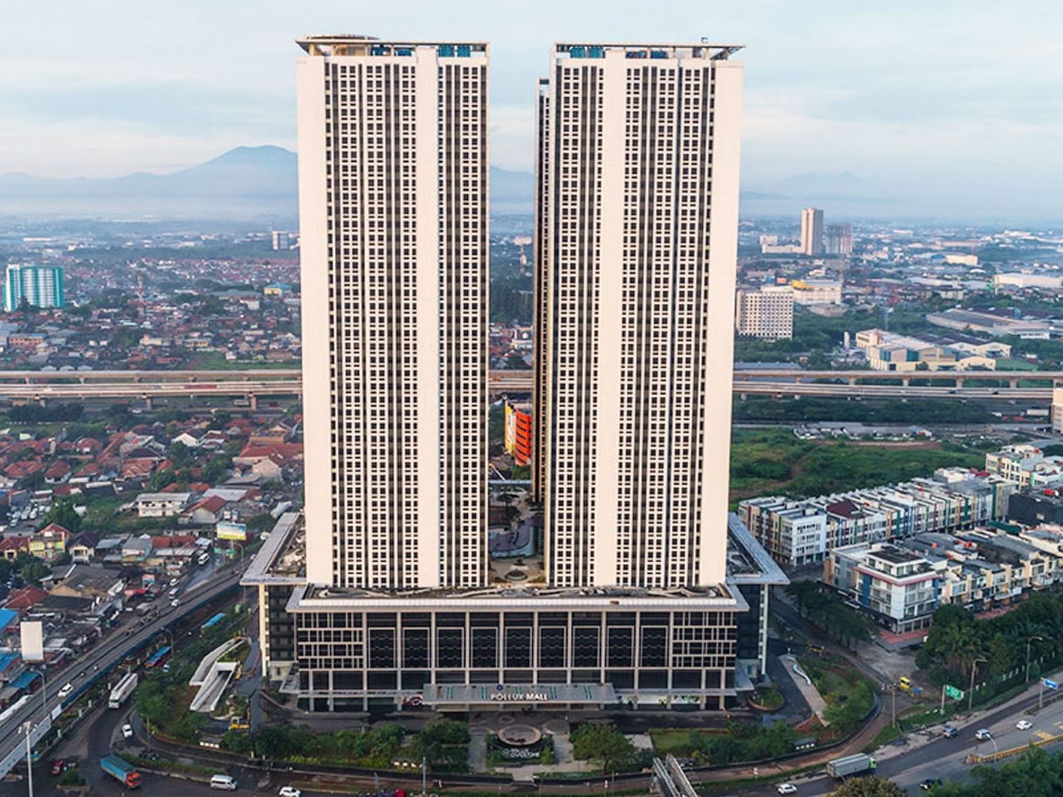 Panoramic view of the hotel building and the city at LK Cikarang Hotel & Residences