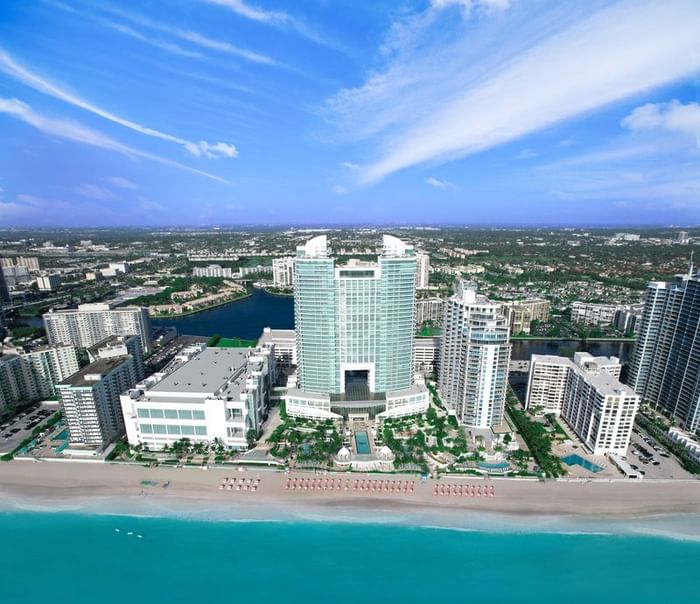 Aerial view of Diplomat Beach Resort with a coastal cityscape