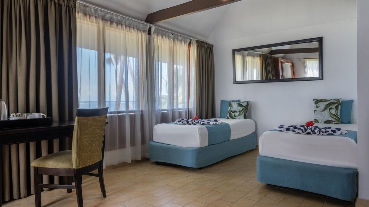 Beach Front Bure with two beds and an ocean view at Tambua Sands Beach Resort in Sigatoka.