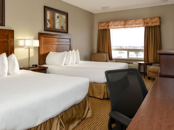 Hotel room with two queen beds and large window