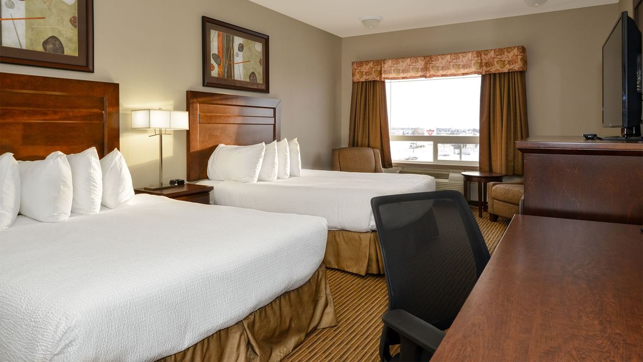 Hotel room with two queen beds and large window
