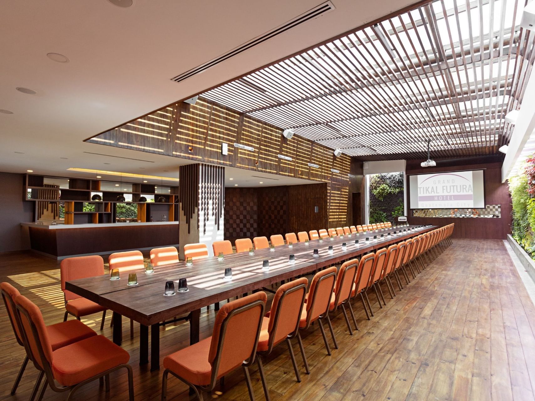 Long conference table in Menta Room at Tikal Futura Hotel