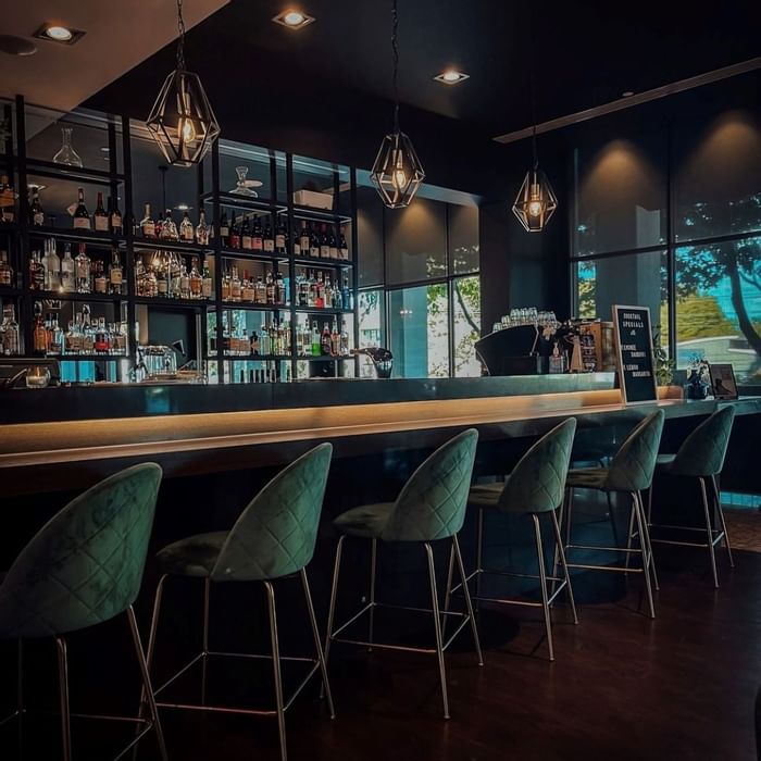 Stools by the counter in Meze Bar at Novotel Glen Waverley