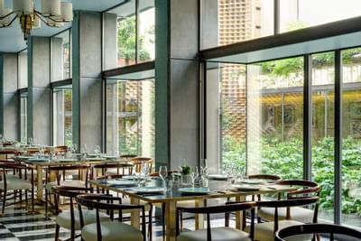 Dining Room with glass wall at Grand Hotel Minerva