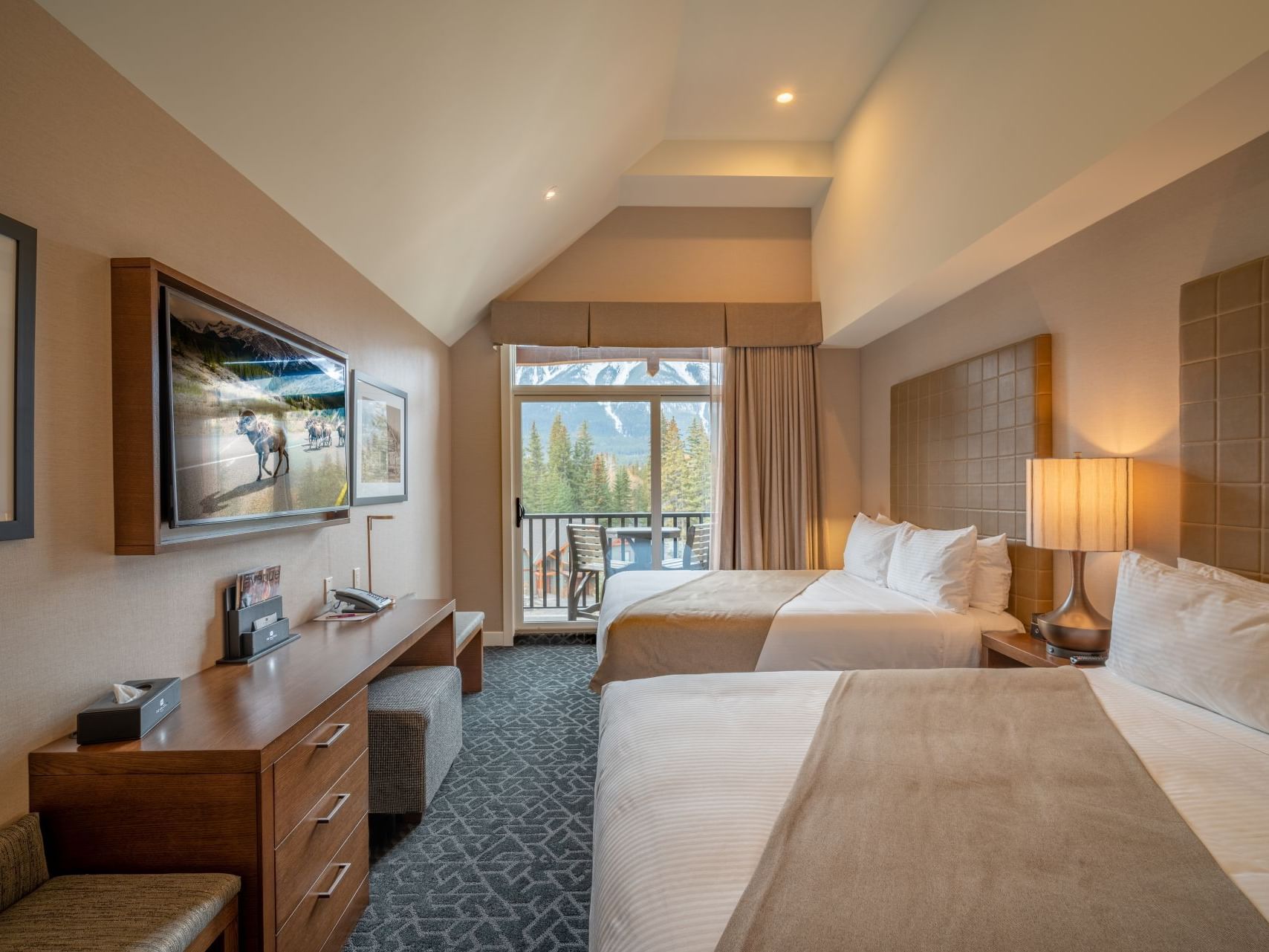 Interior of Premium Double Queen bedroom at Malcolm Hotel