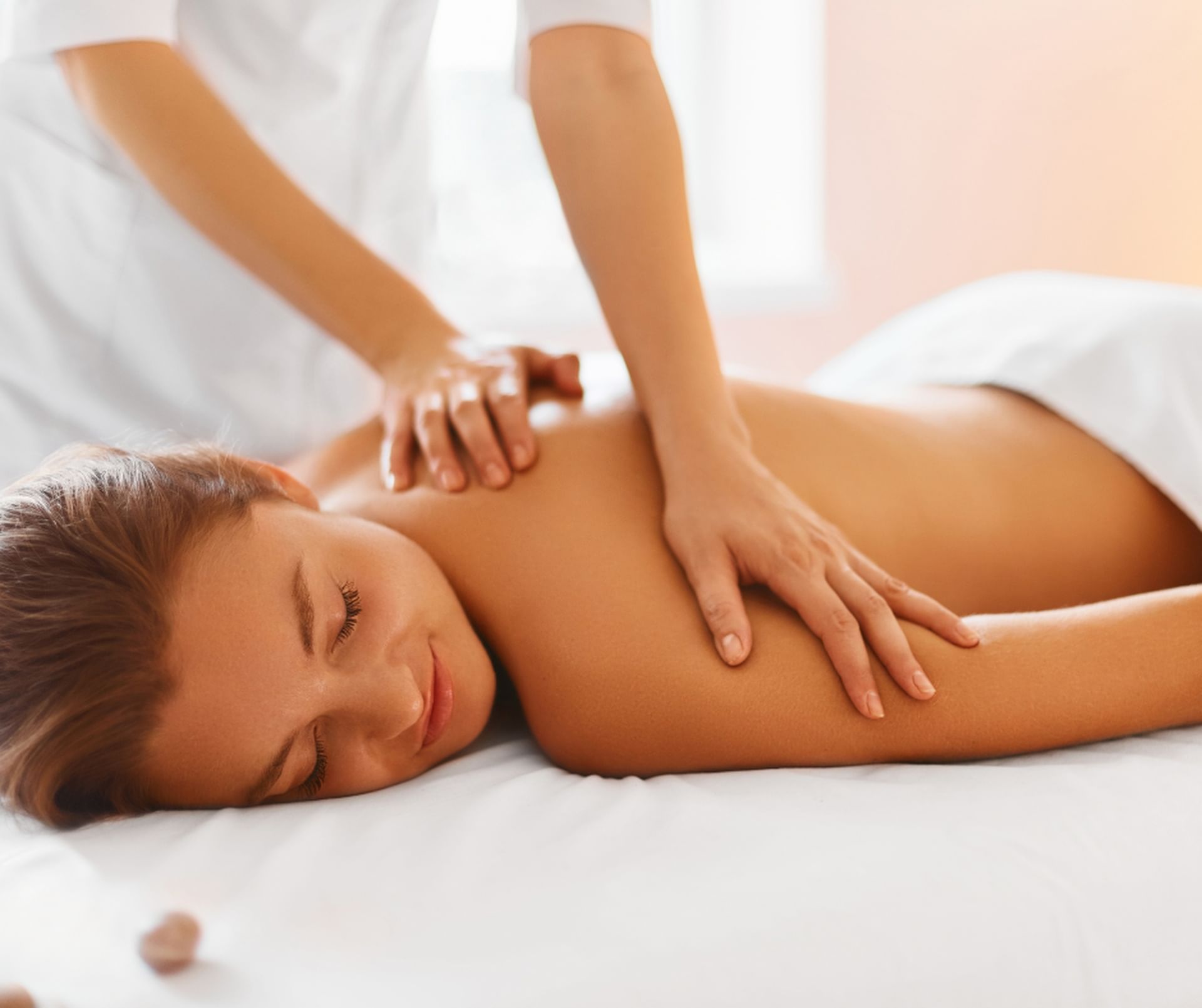 Close-up of lady receiving a body massage in the Spa at Shangri-La Monkey Island