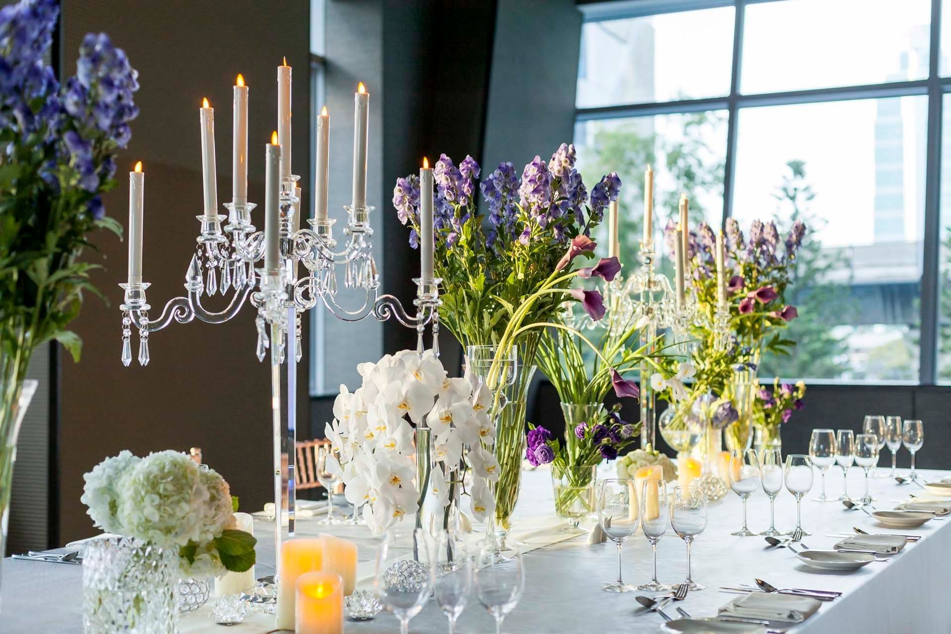 Flowers, candles, cutlery table décor at Okura Prestige Bangkok