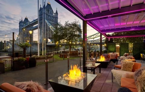 Lounge area with firepits by the Tower Bridge at Guoman Hotels