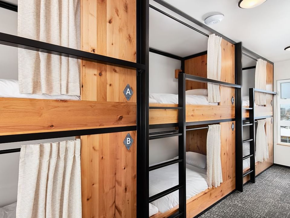 Wide-angle shot of Group Bunkroom at Kinship Landing