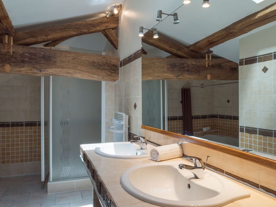 Bathroom vanity in bedrooms at Le Relais de Saint-Preuil