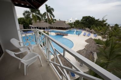 Pool sight from a room balcony at Playa Blanca Beach Resort