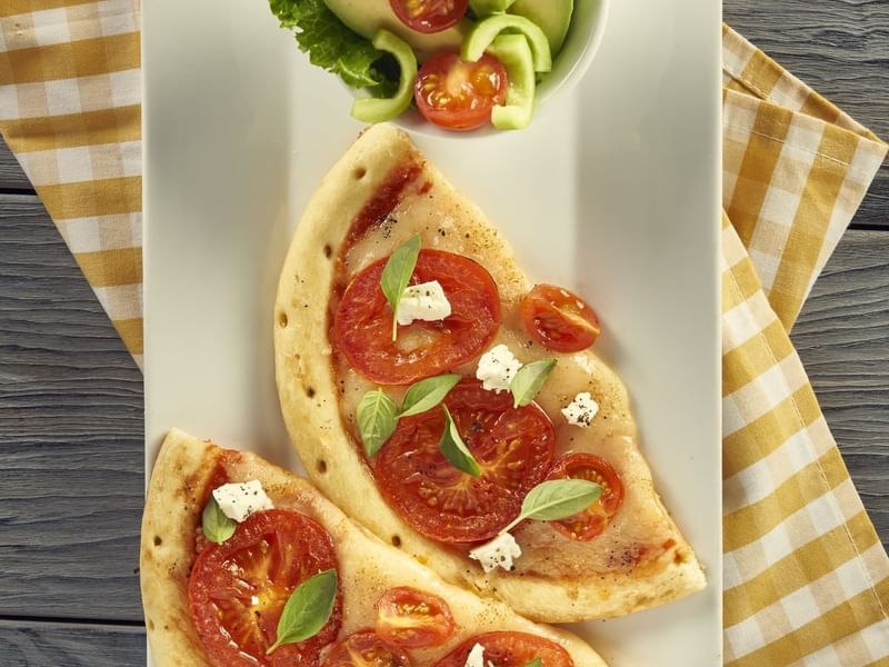 Close-up of a pizza made in a kids class at The Explorean Resorts