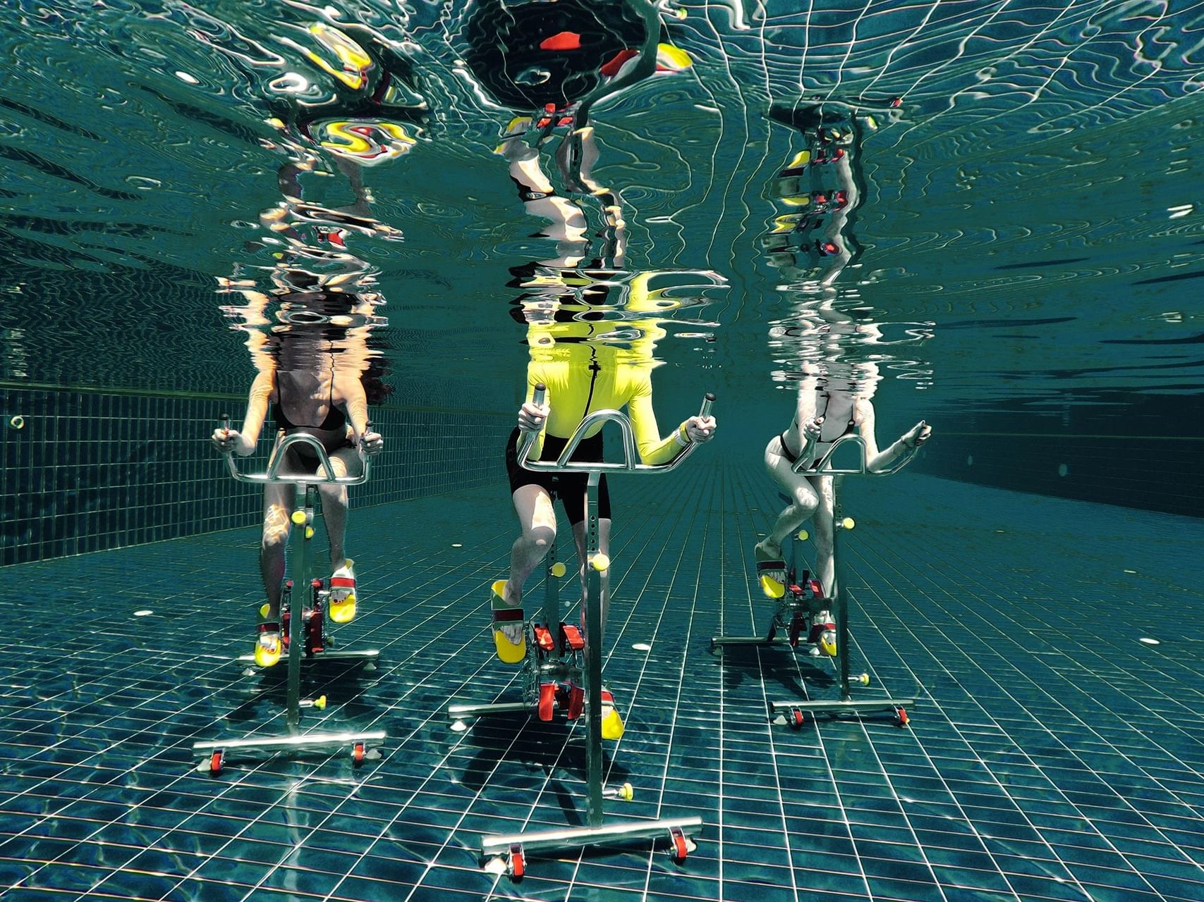 Water bikes in the pool at Titanic Luxury Collection Bodrum.