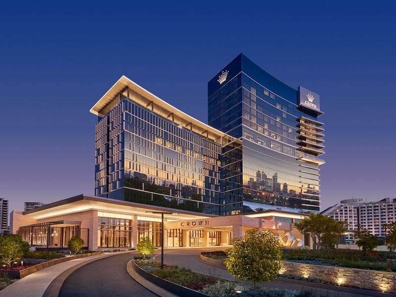 Exterior view of Crown Towers Perth Hotel façade at evening