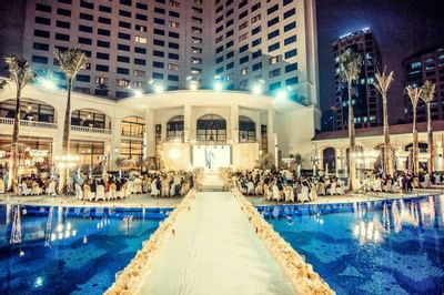 Nighttime outdoor wedding ceremony at Hanoi Daewoo Hotel