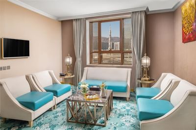 Living area with TV in Junior Suite at Elaf Al Taqwa