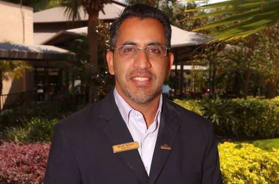 Portrait of Miguel Bouret, Assistant General Manager at Rosen Inn at Pointe Orlando