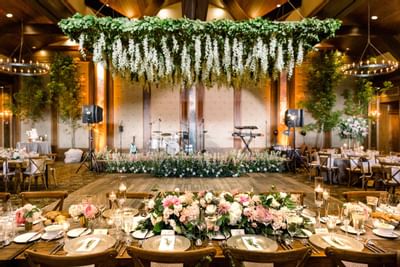 Flower arrangements of a wedding reception in Stein Eriksen Lodge