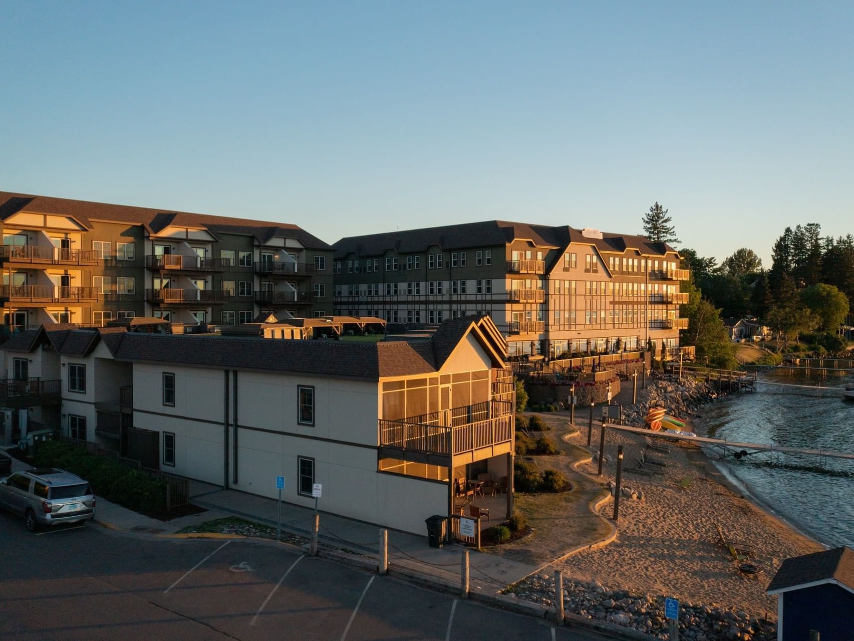 An exterior view of Chase on The Lake with parking area