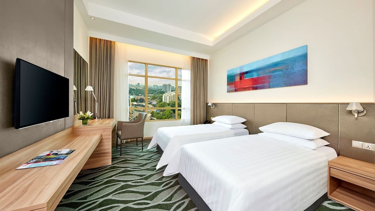 Tufted bed in Deluxe Plus King Room at Sunway Lagoon Hotel