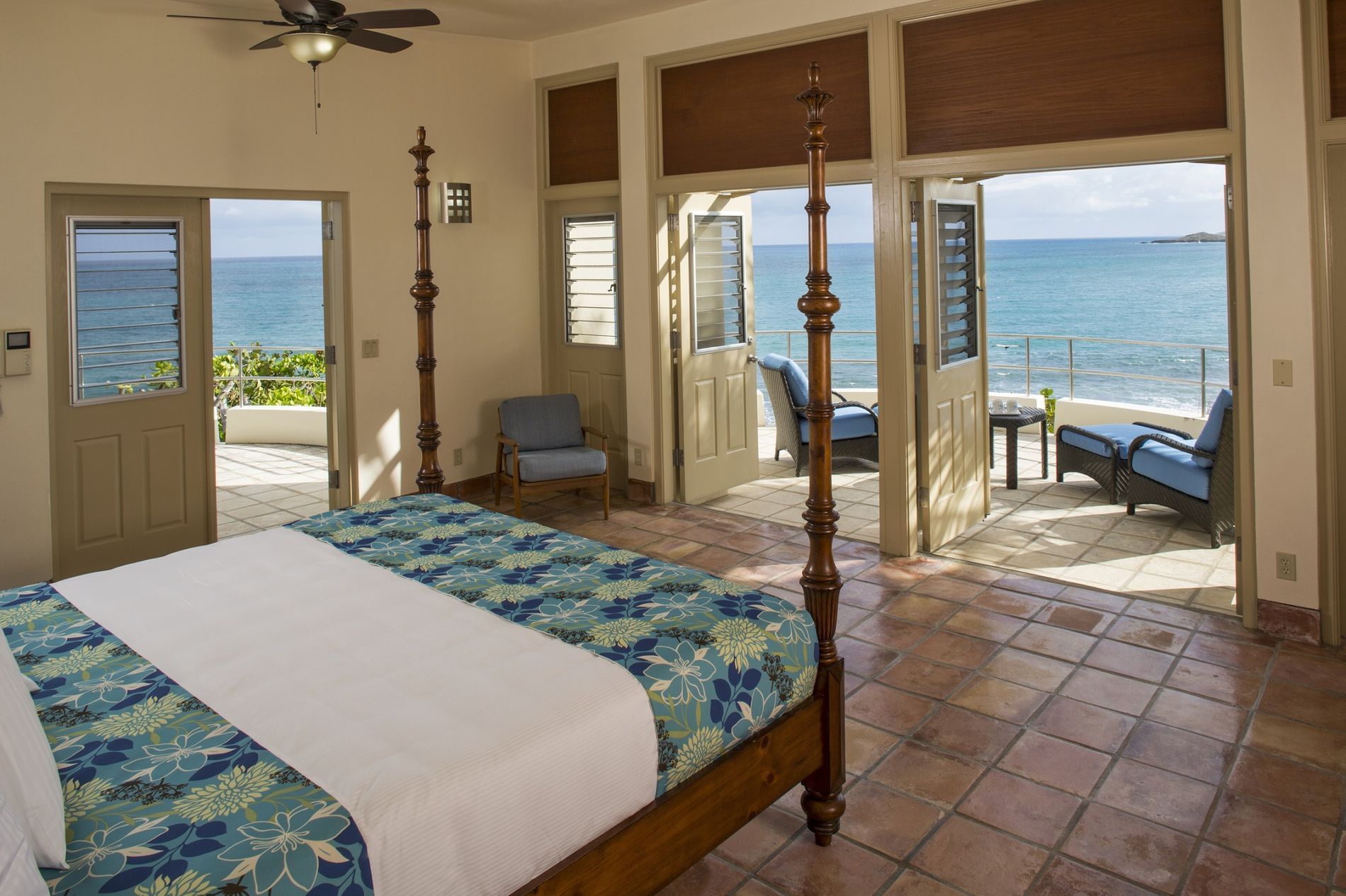Suite with balcony lounge area & sea view at The Buccaneer Resort St. Croix