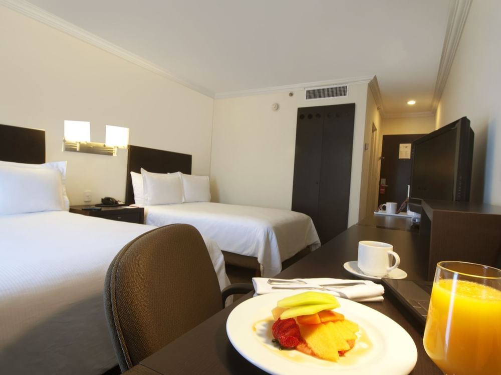 Breakfast served with drinks in Superior Room at Fiesta Inn