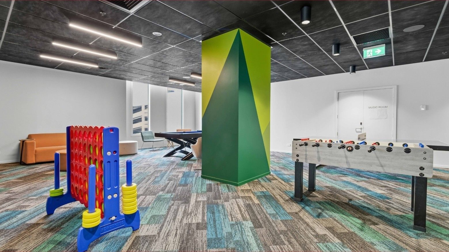 Mayoral Drive Student Accommodation games room with foosball table and giant board game.